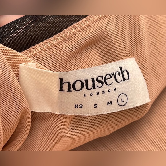 House of CB Tibi Black Cutout Ruched Midi
Dress large - Picture 12 of 16